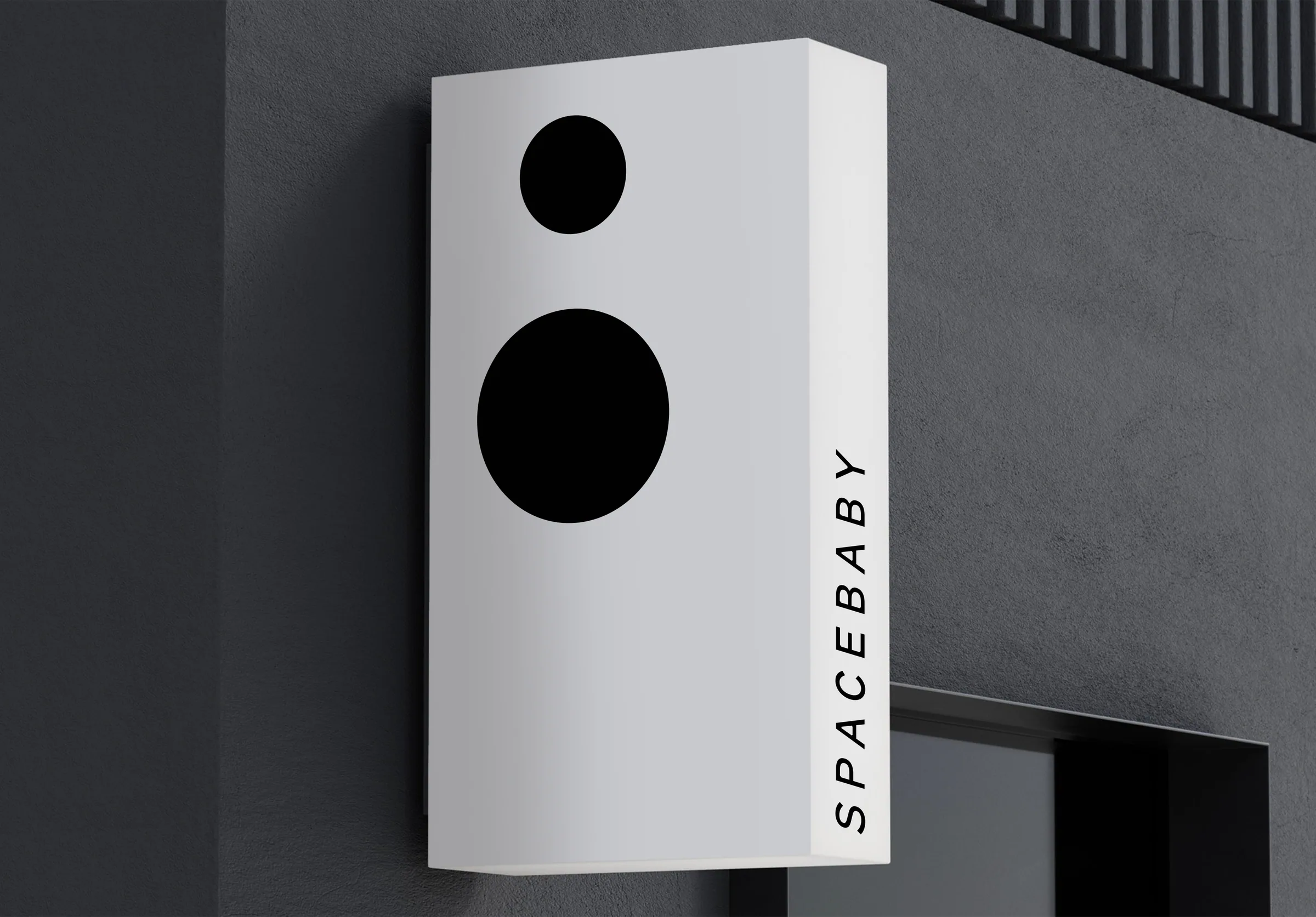 Spacebaby lightbox sign on a building facade